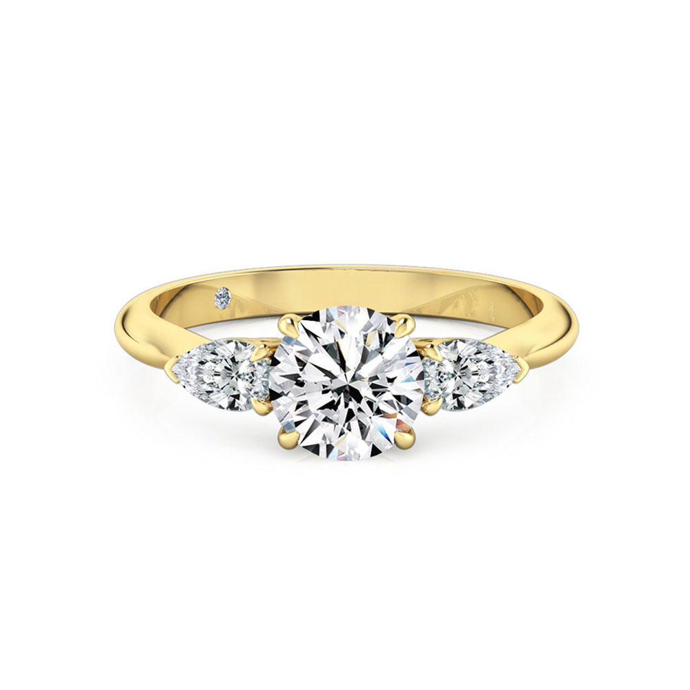 Round Diamond With side pear cut  Engagement Ring