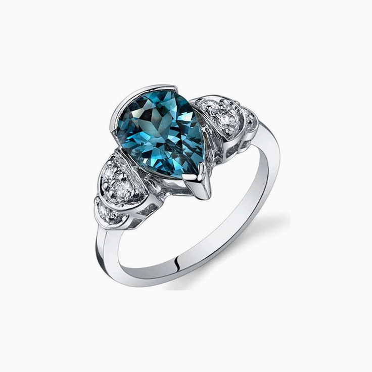 Classic Pear Shaped London Blue Topaz And Diamond Ring