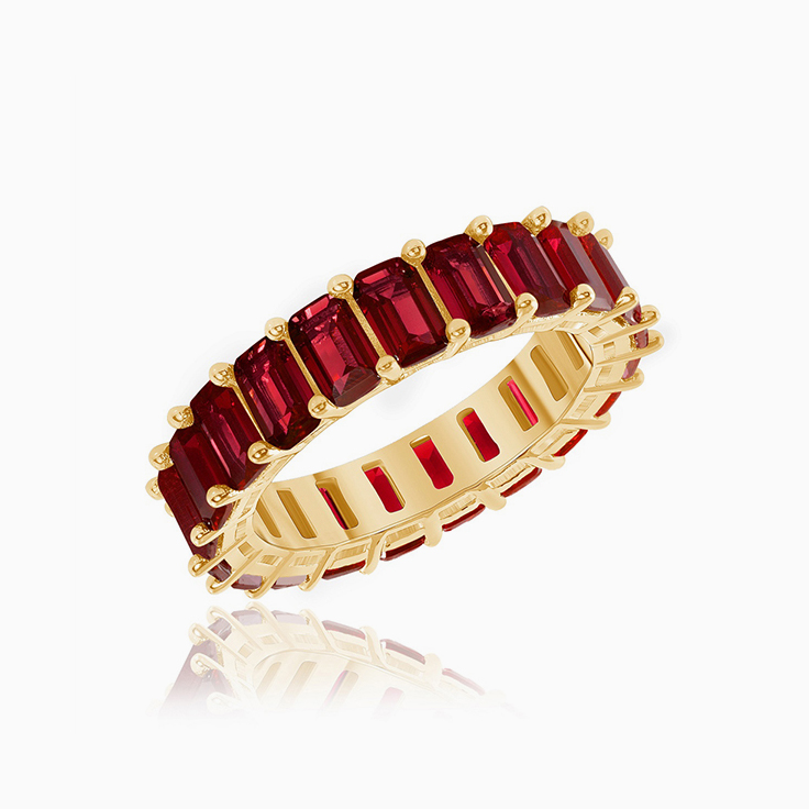 Emerald cut ruby eternity ring