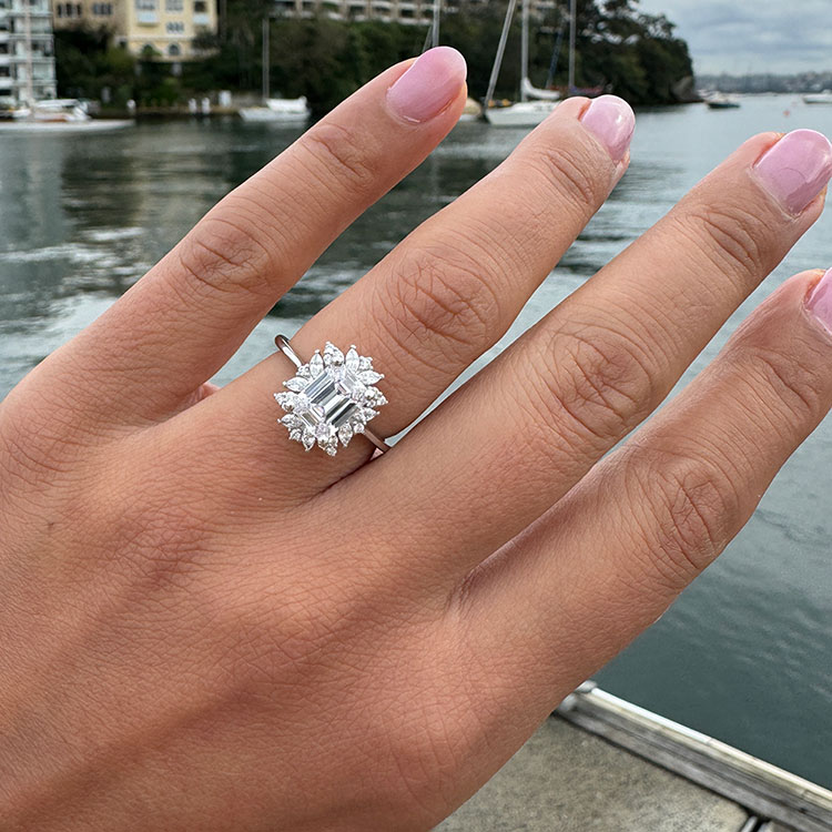 Custom made emerald cut engagement ring