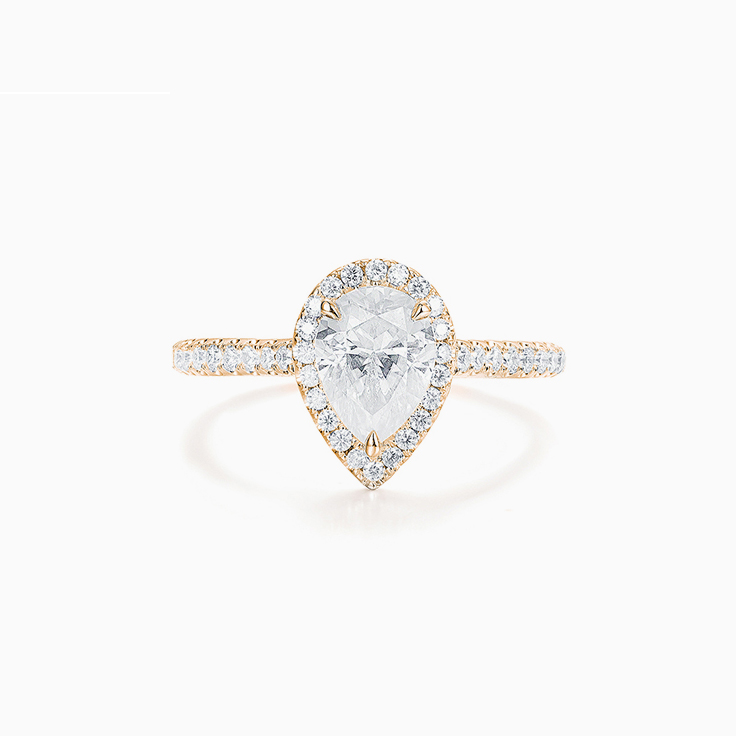 Pear Cut Diamond Engagement ring with a Diamond Halo