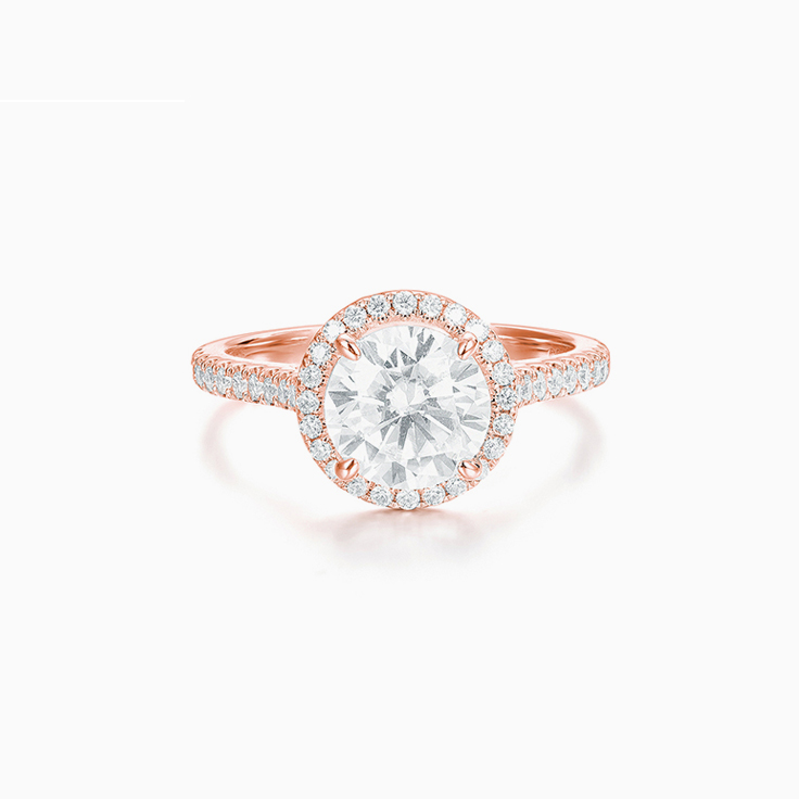 Classic Round Brilliant Engagment ring with a Diamond Halo