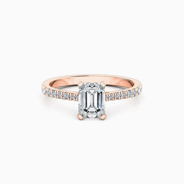 Emerald Cut Engagement Ring On A Pave Band