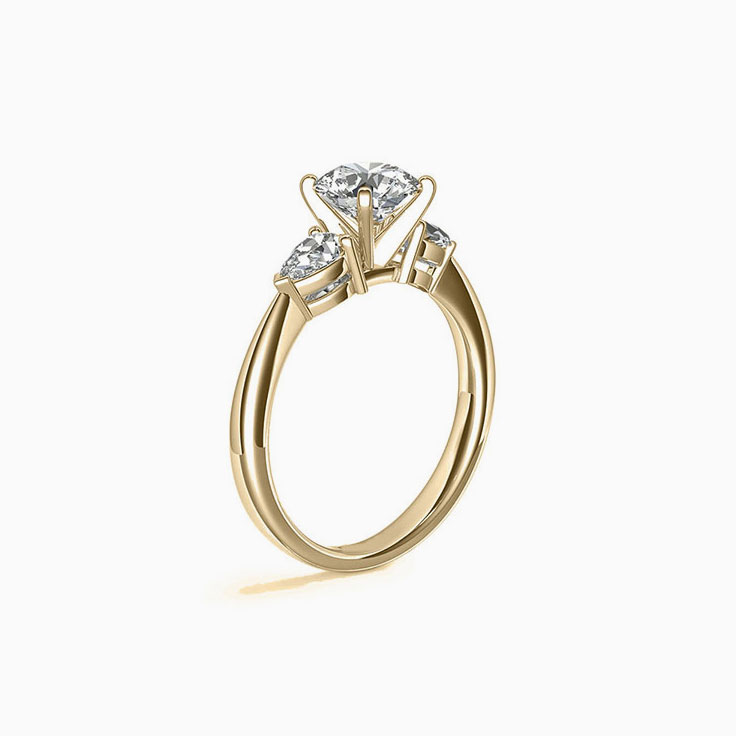 Brilliant Round And Pear Diamond Engagement Ring