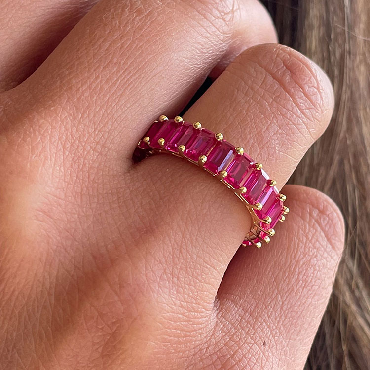 Emerald cut ruby eternity ring