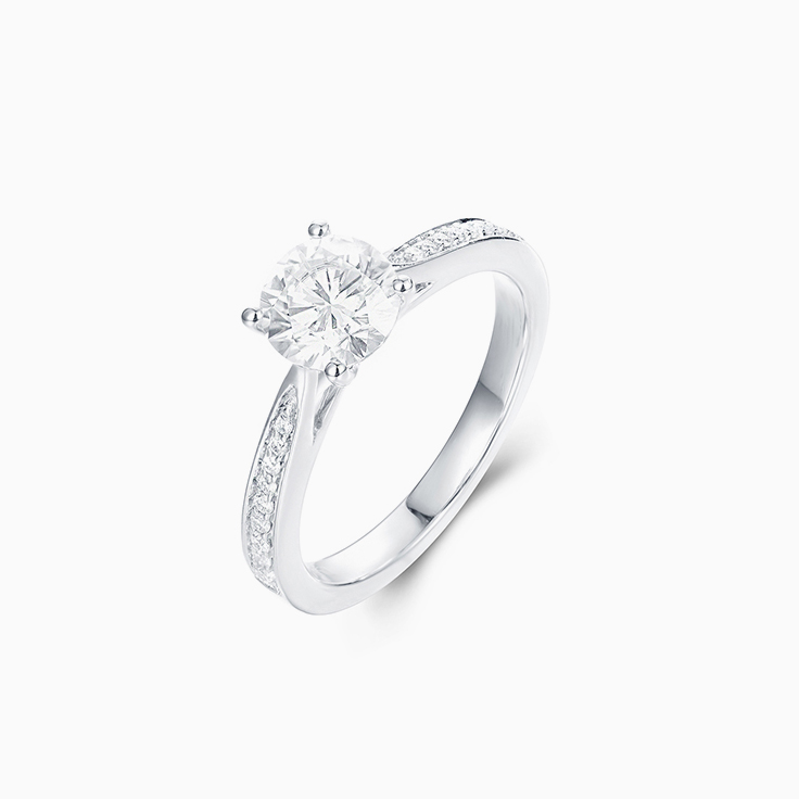 Round Brilliant cut Solitaire with a pave band Engagement Ring