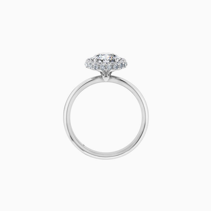 Round brilliant cut diamond with a 3d halo engagement ring